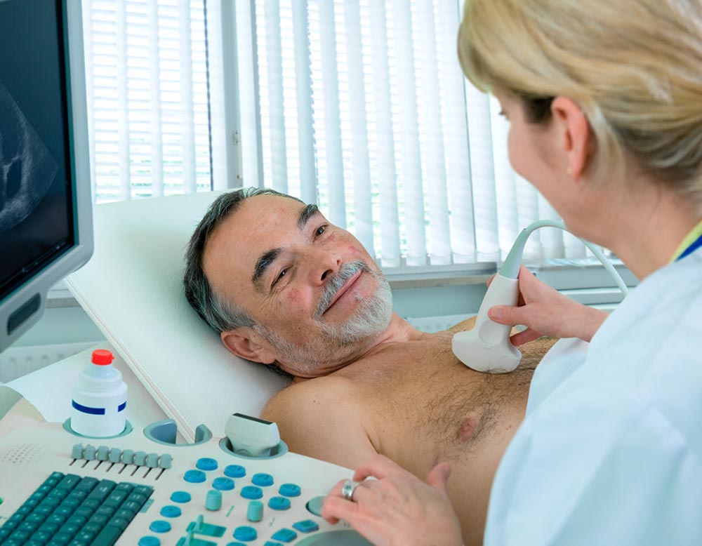 Patient Receiving Echo-cardiogram Patient Receiving Echo-cardiogram